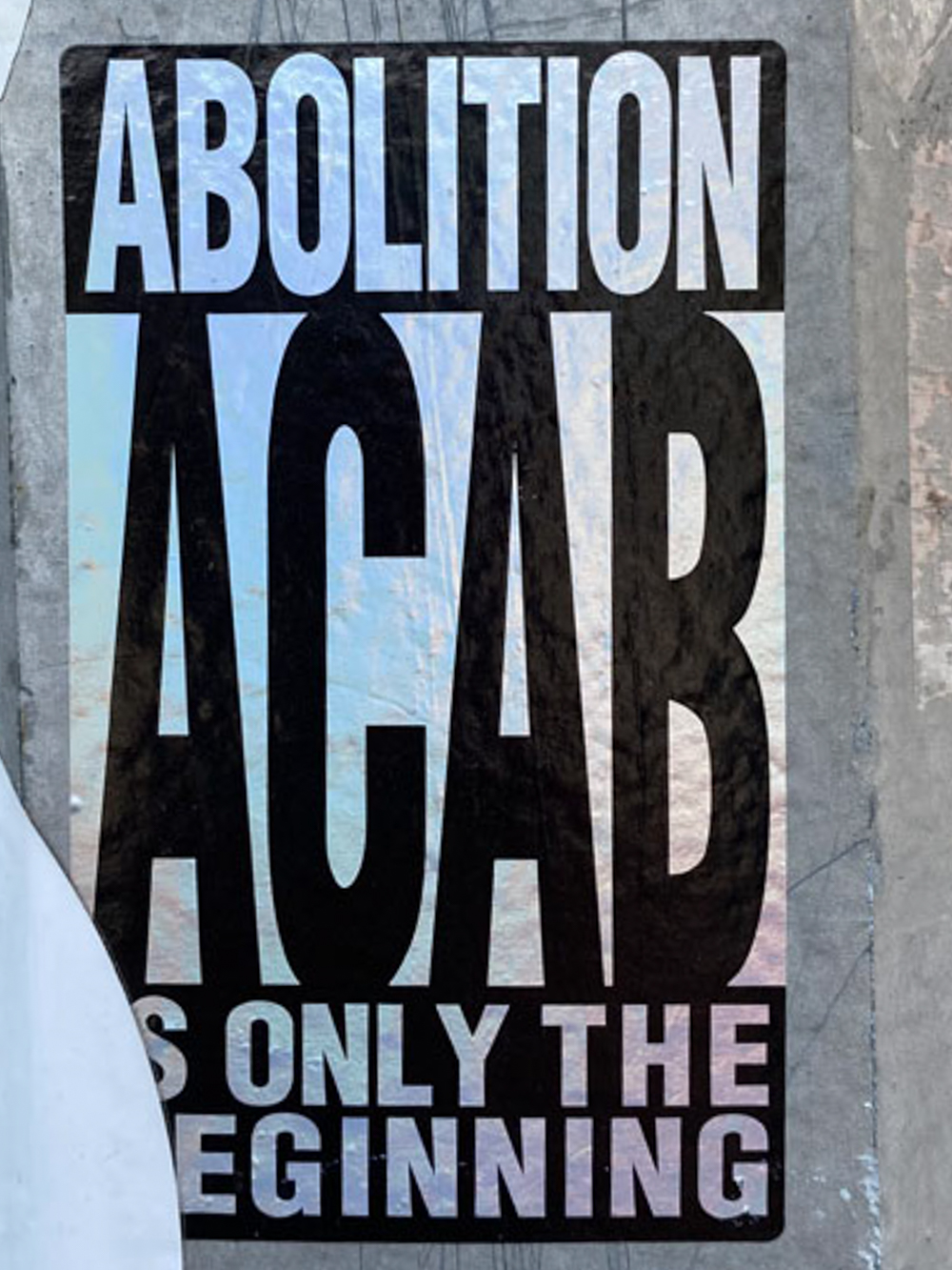 ABOLITION "ACAB" IS ONLY THE BEGINNING, is a sticker art and can found at 943-857 Bergen St, Brooklyn, NY.